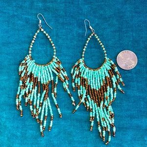Turquoise and gold hand beaded earrings.